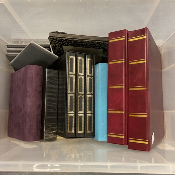Lot of empty photo albums for scrapbooking and photo storage.
