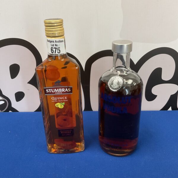 Sealed bottles of stumbras quince & absolute vodka