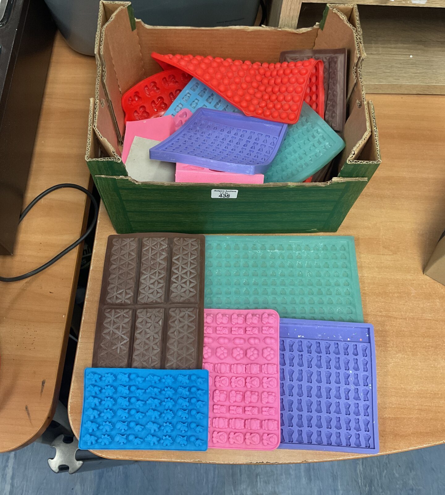 Box full of chocolate/ other moulds