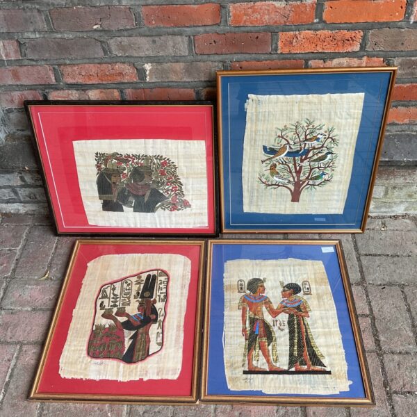 Four framed Egyptian artworks on papyrus