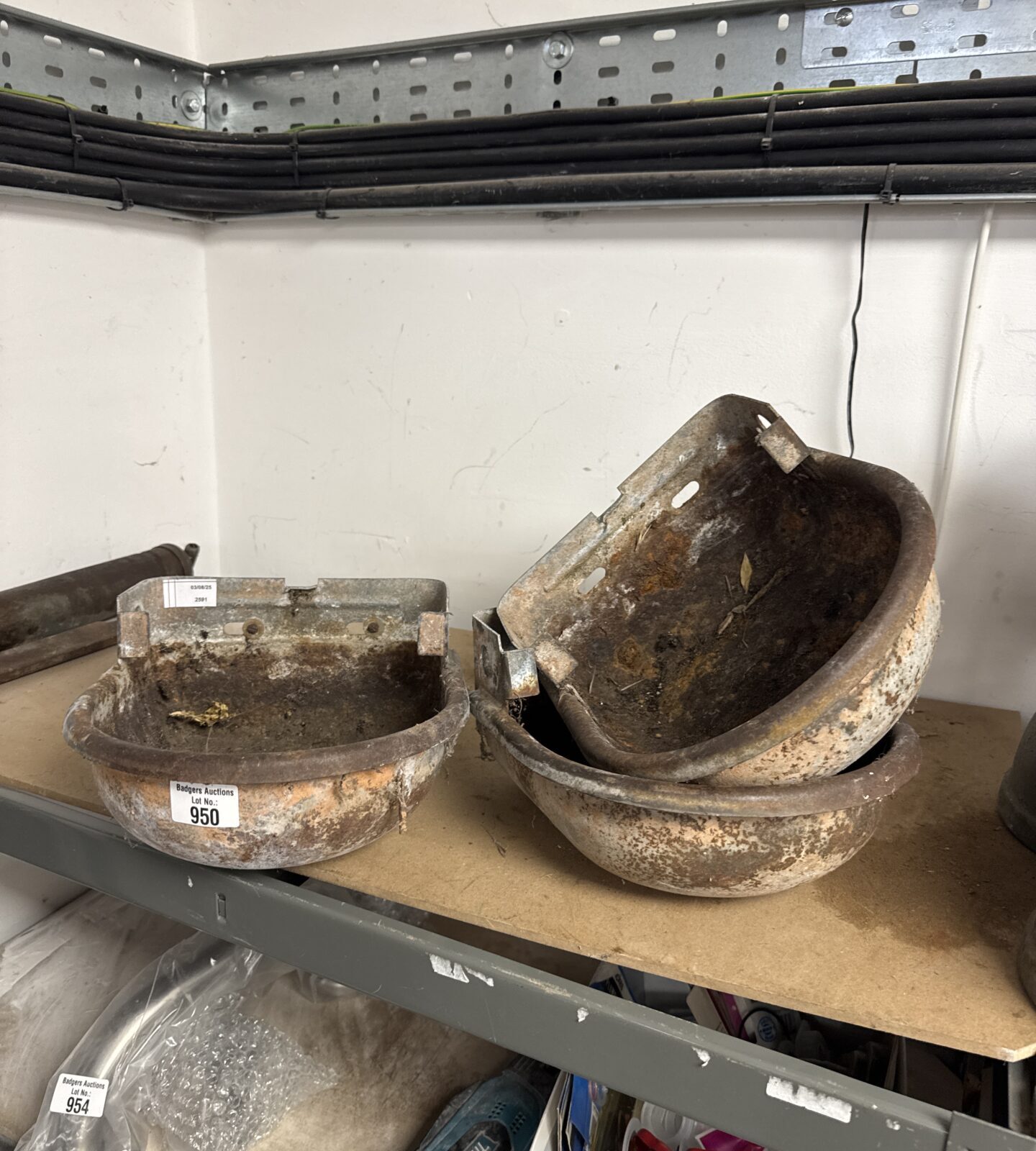 Three vintage heavy metal wall hanging planters