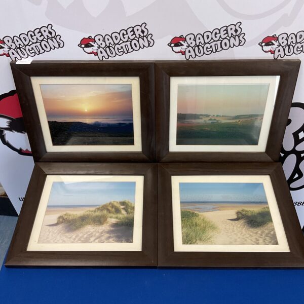 Set of four framed photographic prints