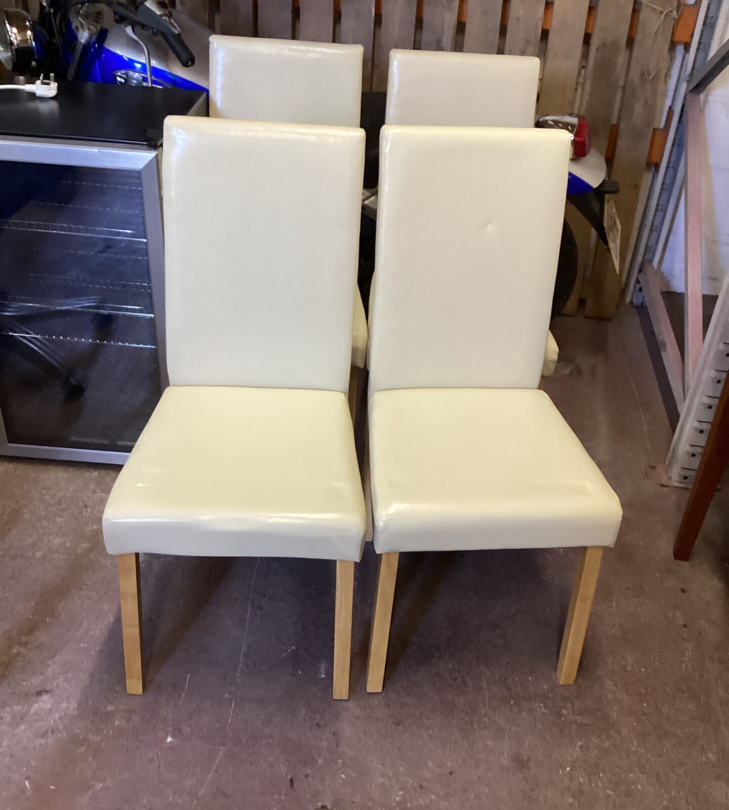 Four Dunelm Cream Coloured leather effect Dining Chairs