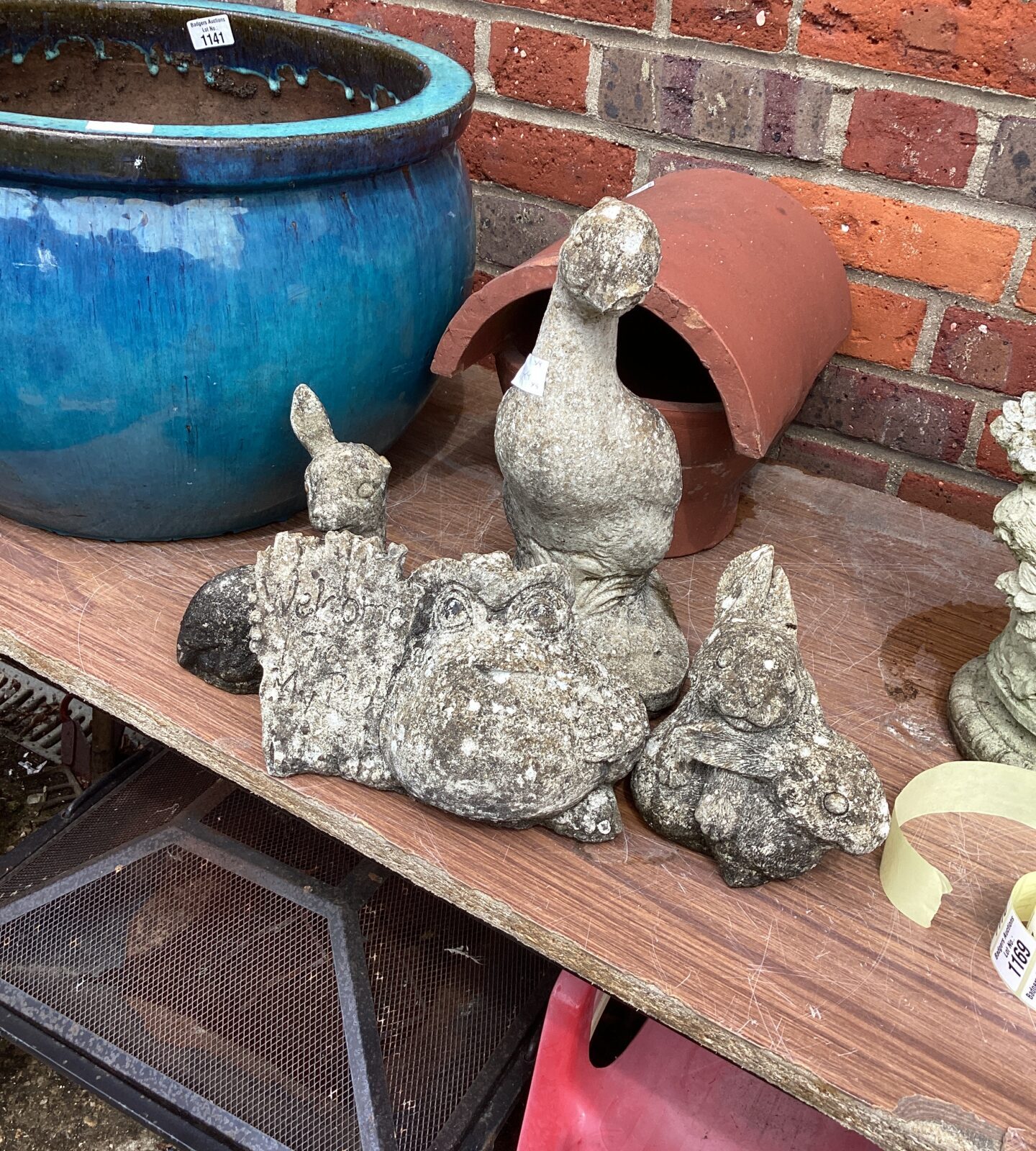 Four small garden ornaments