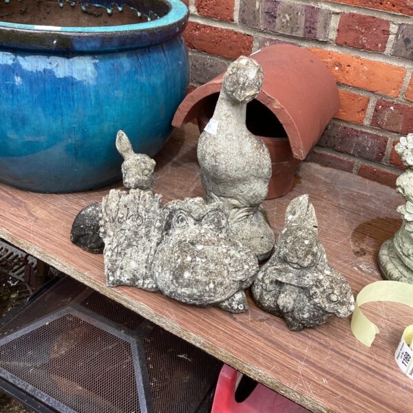Four small garden ornaments