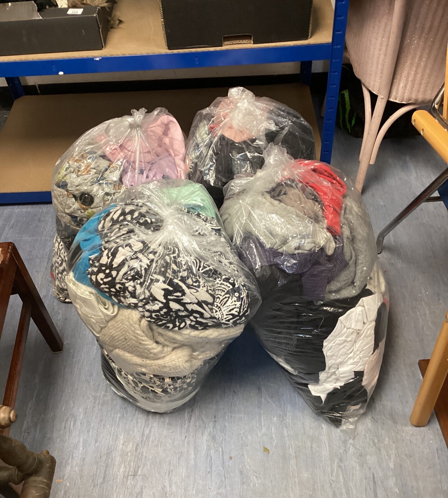 Four bags full of mixed mens & ladies clothing