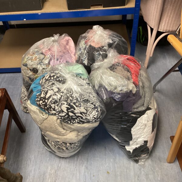 Four bags full of mixed mens & ladies clothing