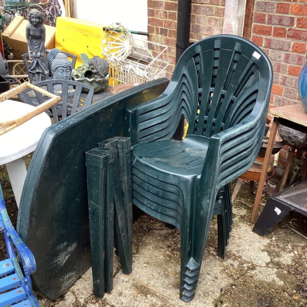 Four plastic Chairs with Table patio set