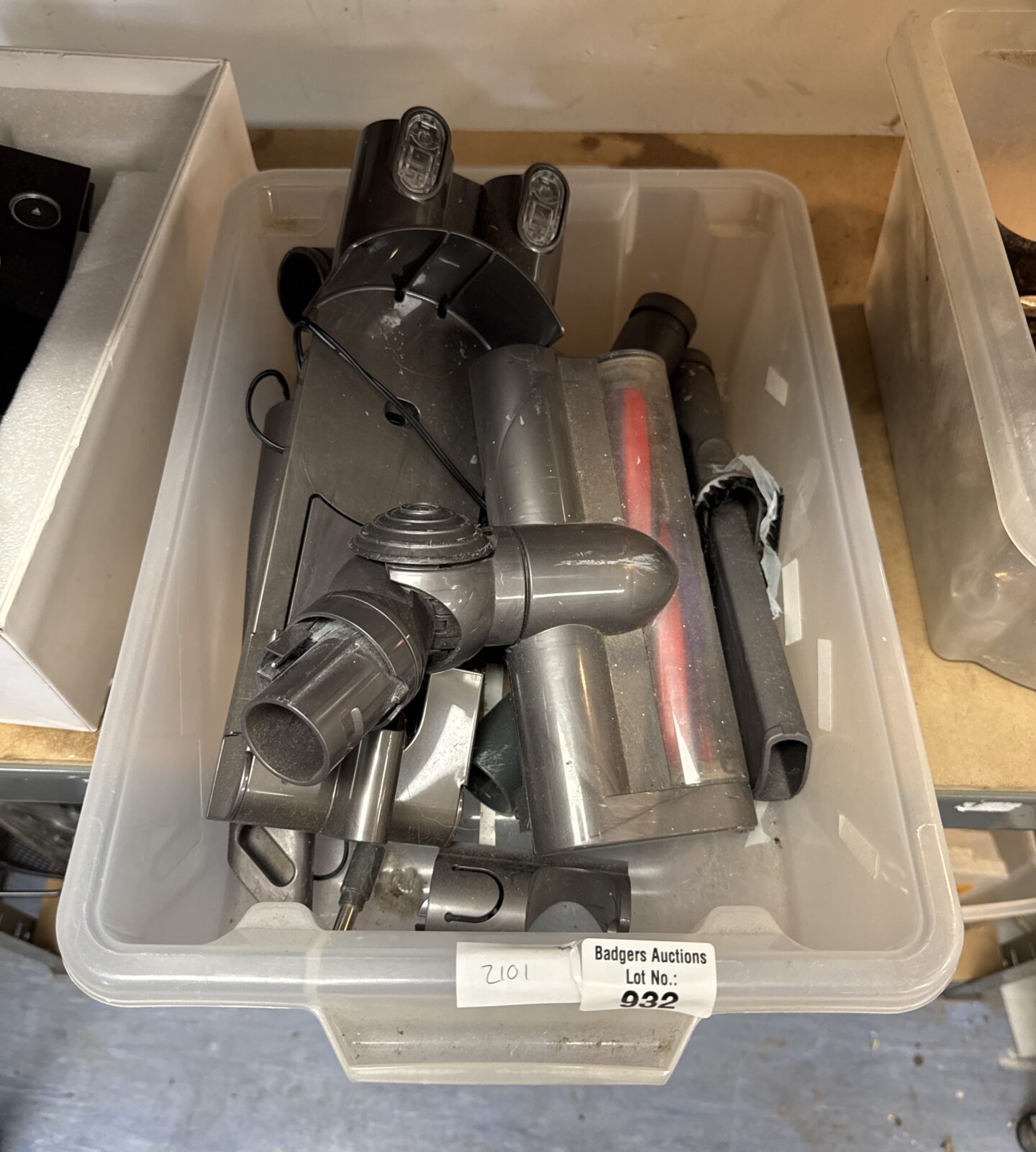 Small tray of Dyson cordless hoover parts