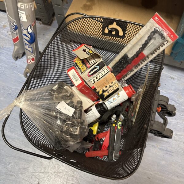 Basket of assorted bicycle parts