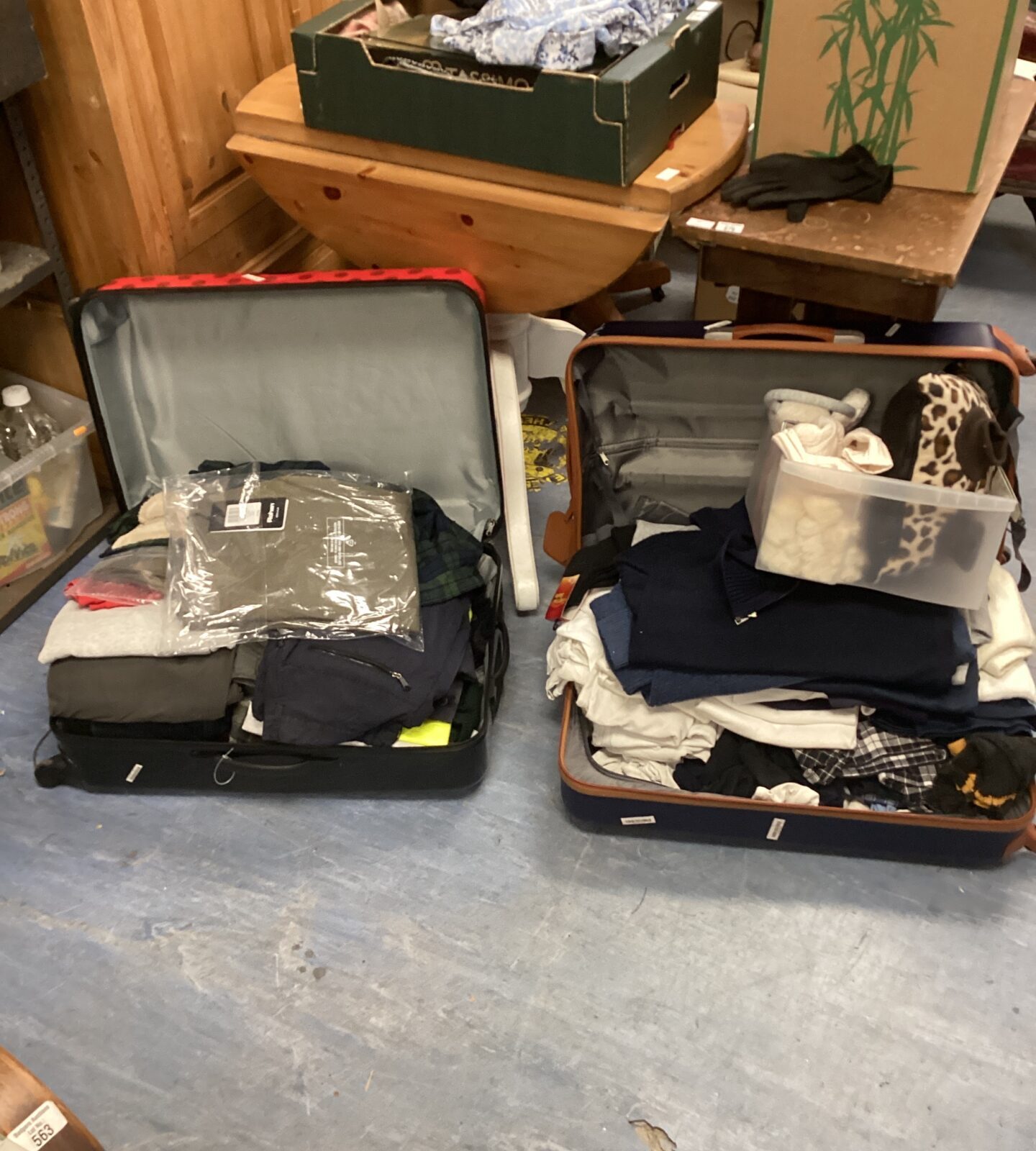 Two large suitcases & drawer of mixed clothing