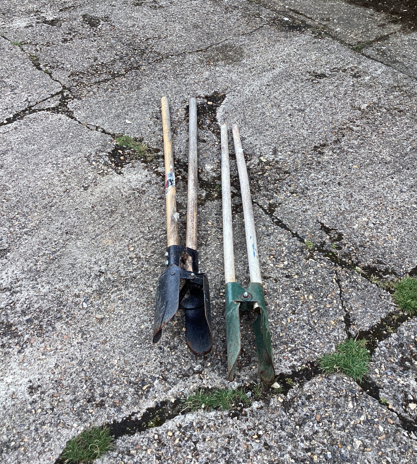 Two hole digging spades