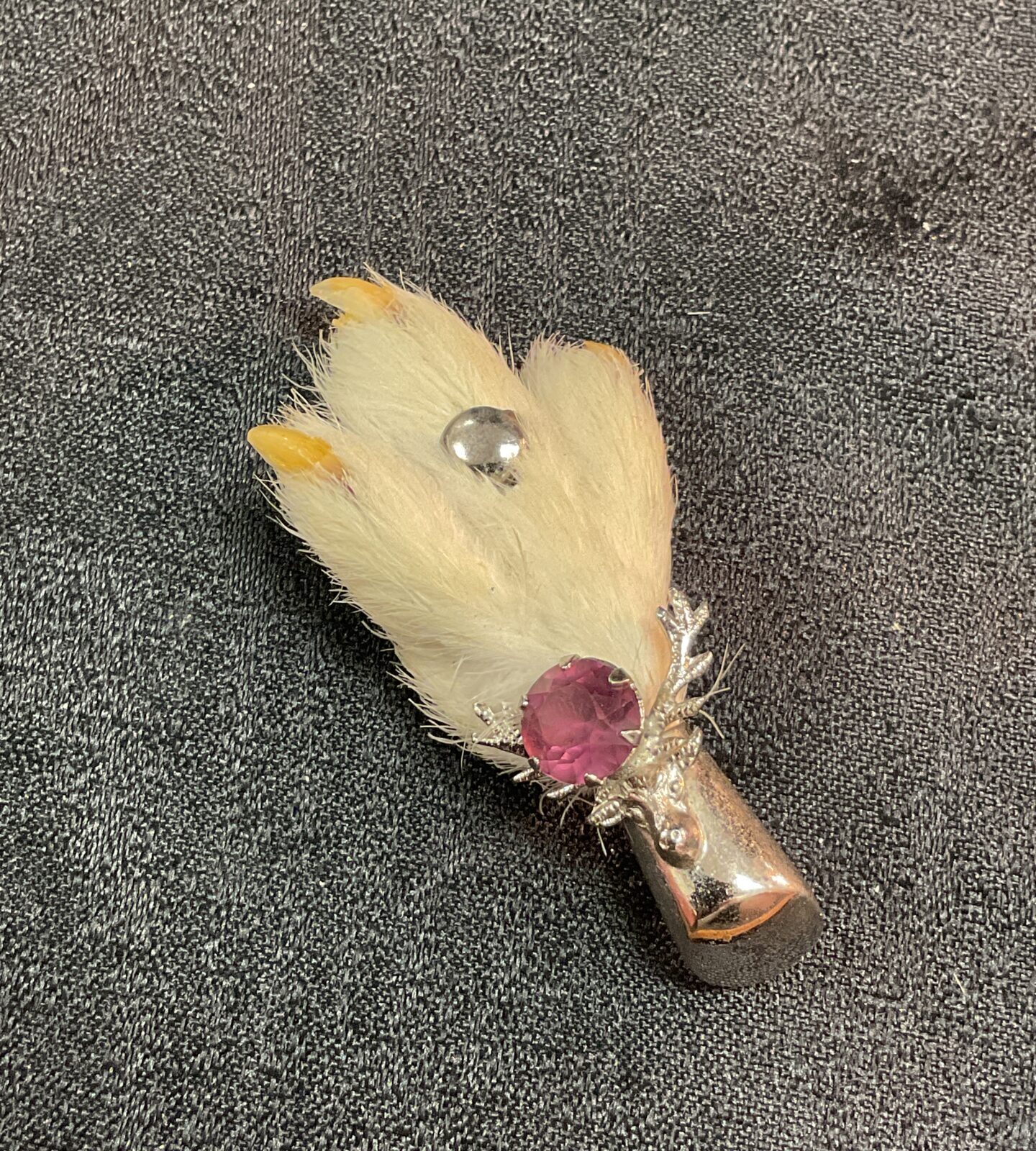 Scottish claw stags head brooch set with amethyst