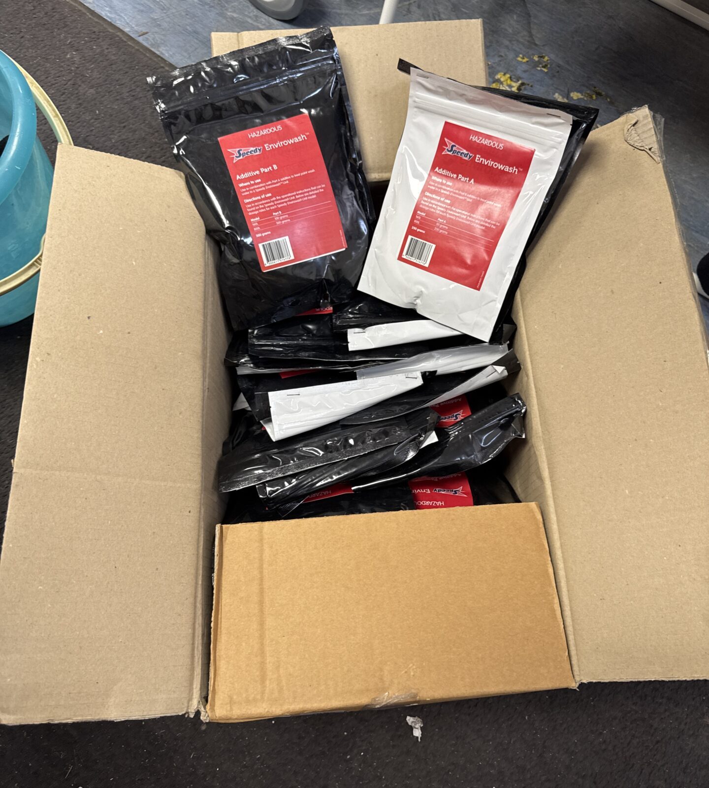Box of speedy hire envirowash additive packs