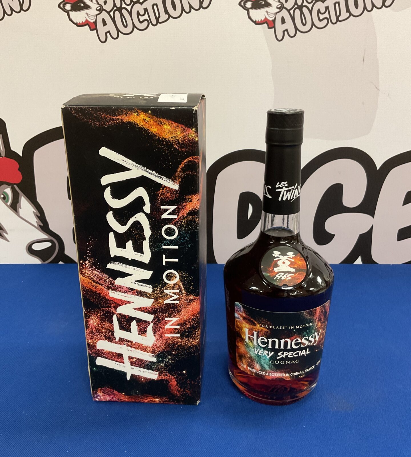 Sealed bottle of hennessy in motion very special cognac