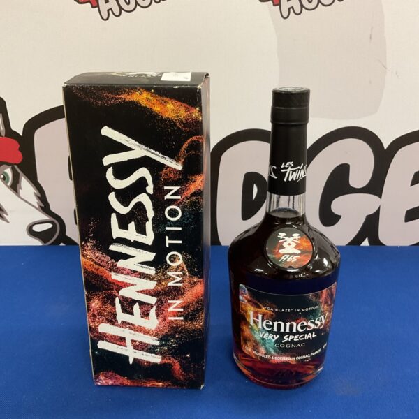 Sealed bottle of hennessy in motion very special cognac
