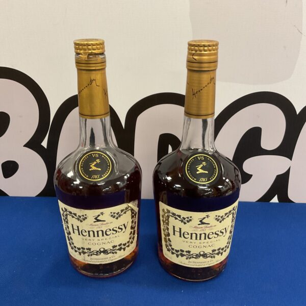 Sealed bottle of Hennessy cognac & part drunk bottle