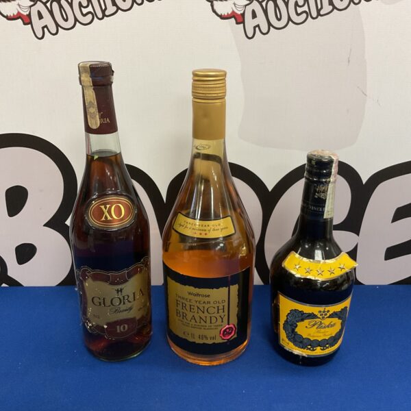 Sealed brandy bottles, Gloria and Pliska brands, vintage alcohol collection.