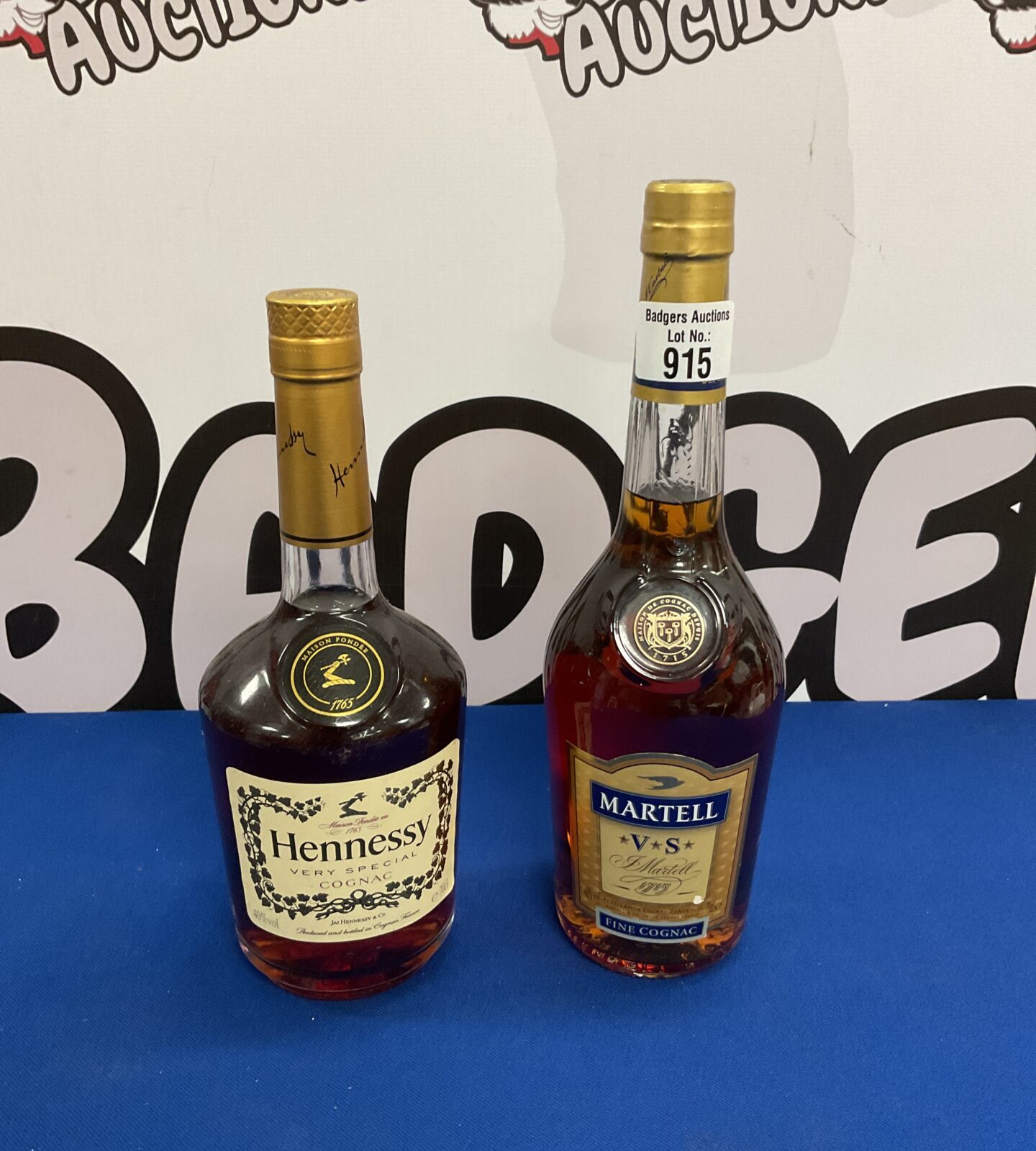 Sealed bottles of hennessy & matrel fine cognac