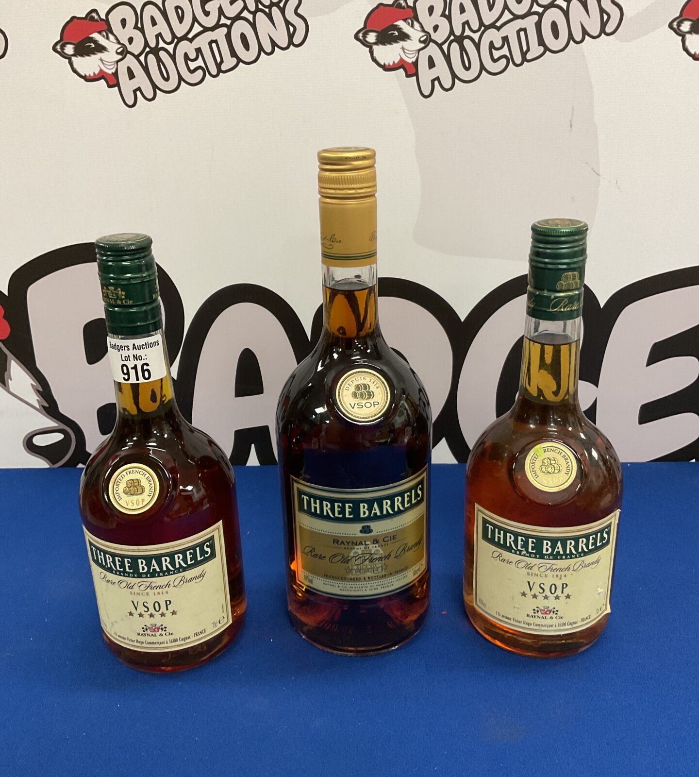 Three Sealed bottles of three barrels rare old french brandy