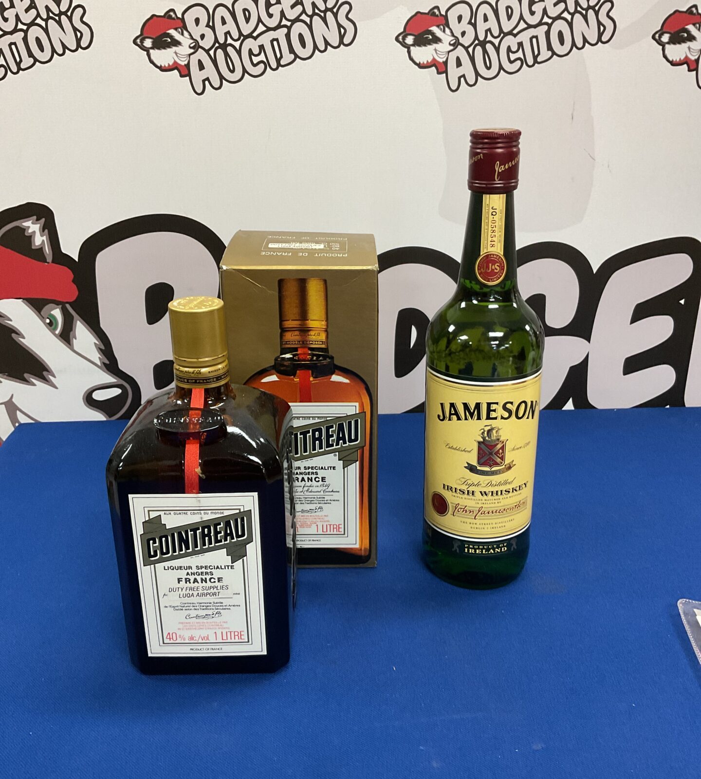 Sealed bottles of jameson irish whisky & cointreau