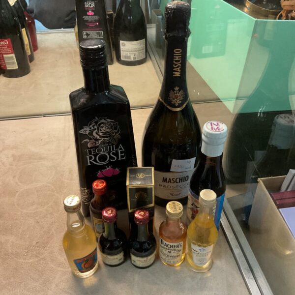 Selection of alcohol including tequila rose & maschio procsecco