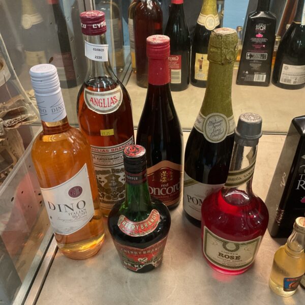 Vintage alcohol lot including Anglias brandy and cherry brandy bottles.