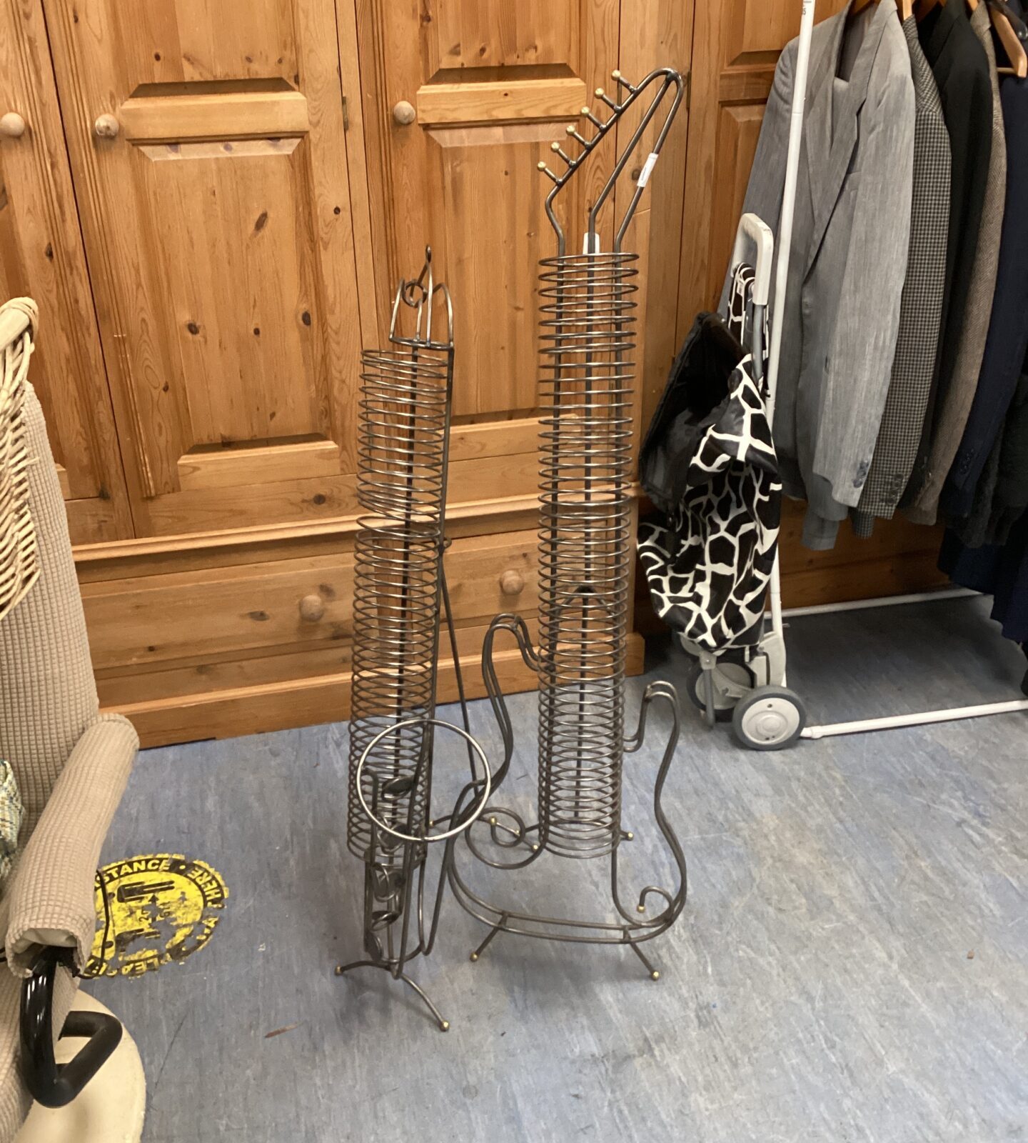 Two metal framed cd racks inc style of saxophone & guitar (guitar needs repairing)