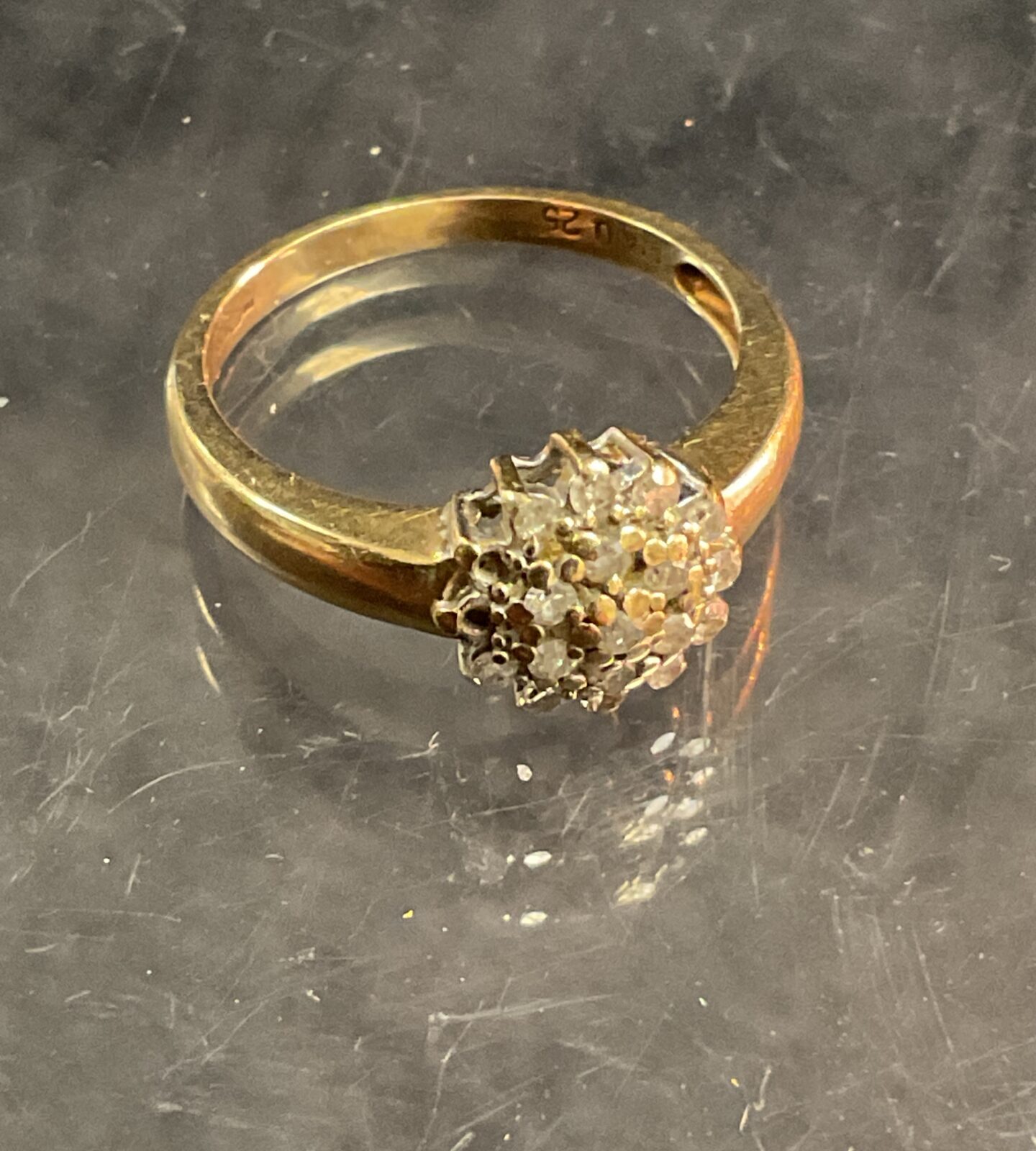 Hallmarked 9 ct gold diamond cluster ring 2.34g gross size l missing two stones