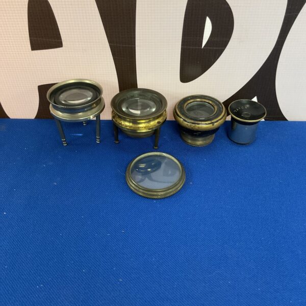 Group of vintage map reading glasses for surveying.