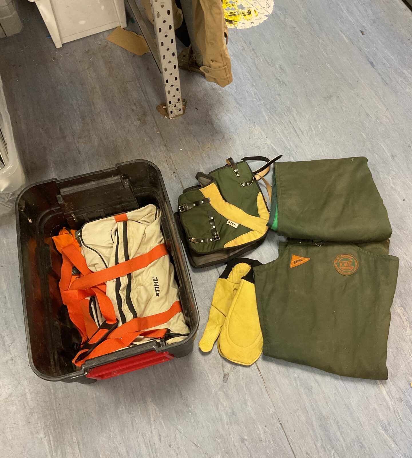 Box of tree surgeon items including stihl