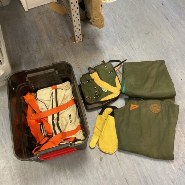 Box of tree surgeon items including stihl