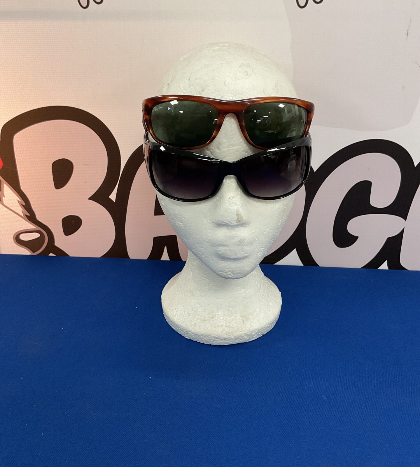 pair vintage ray ban sun glasses & pair vintage british iware sunglasses