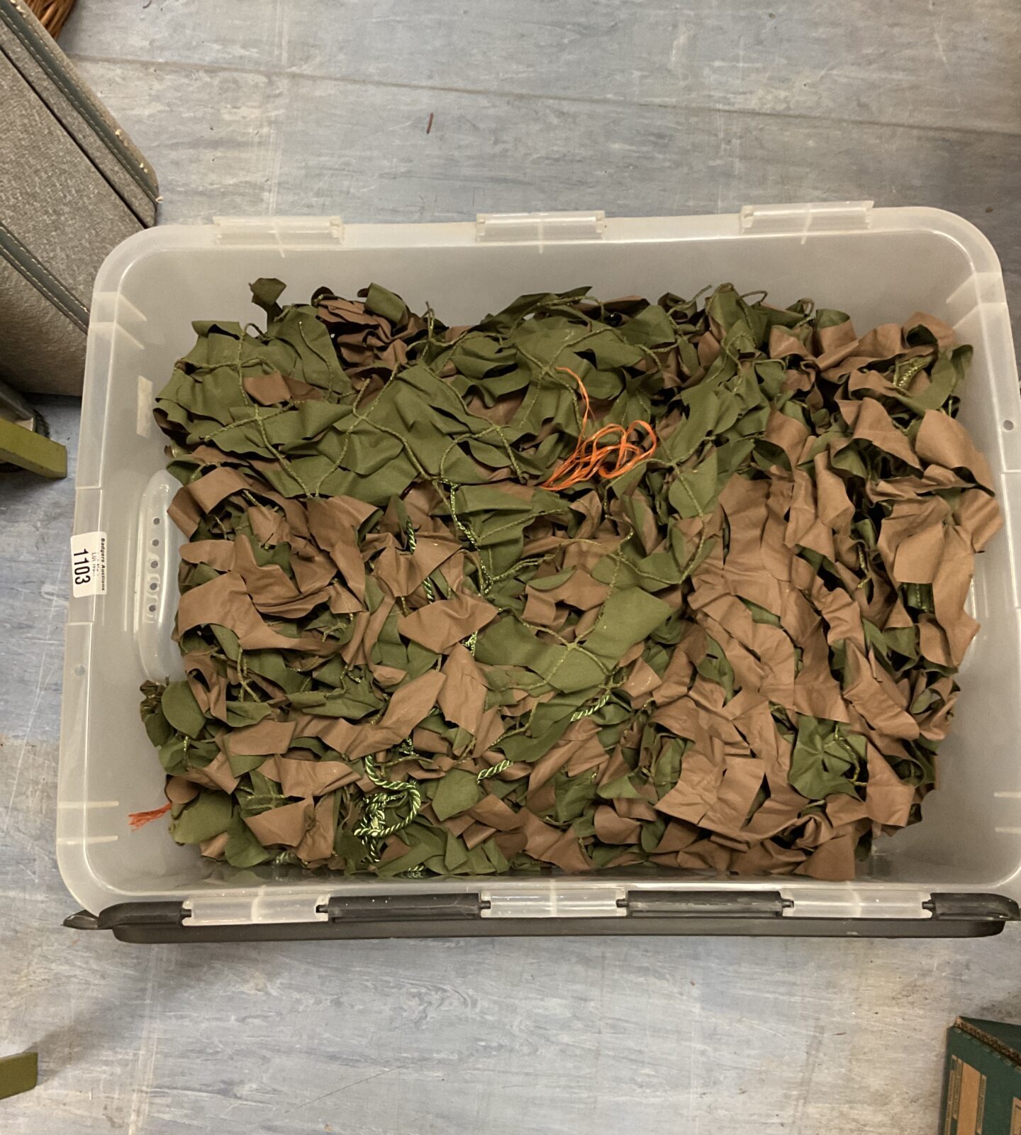 Box full of camouflage netting