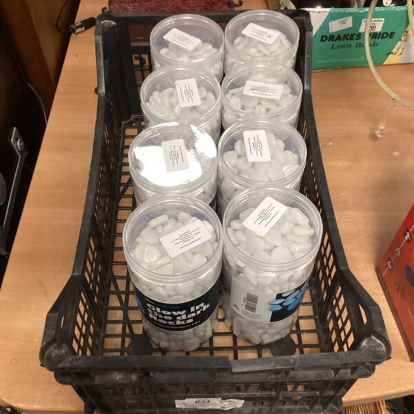 Eight boxes of glow in the dark rocks