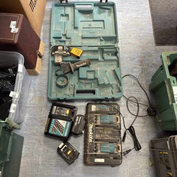 Makita battery charger kit with multiple batteries in a case.