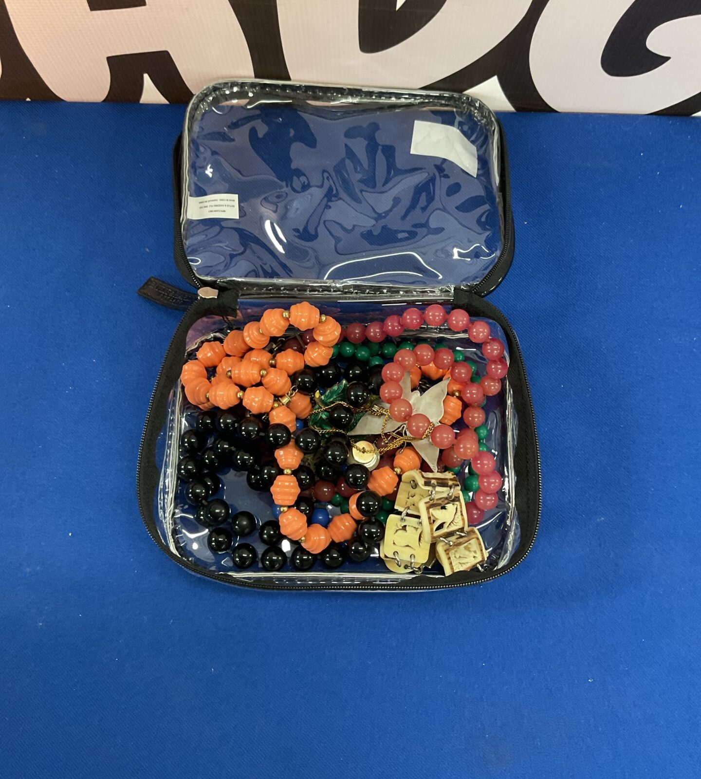 Box of mixed beaded necklaces and bracelets