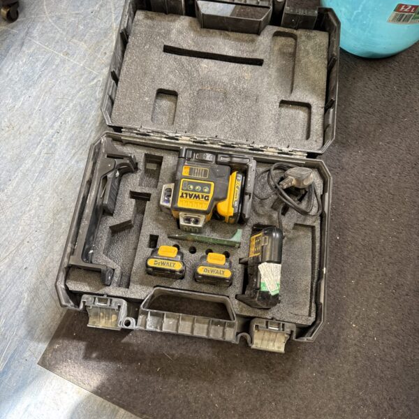 Open Dewalt laser level set carry case with components inside.
