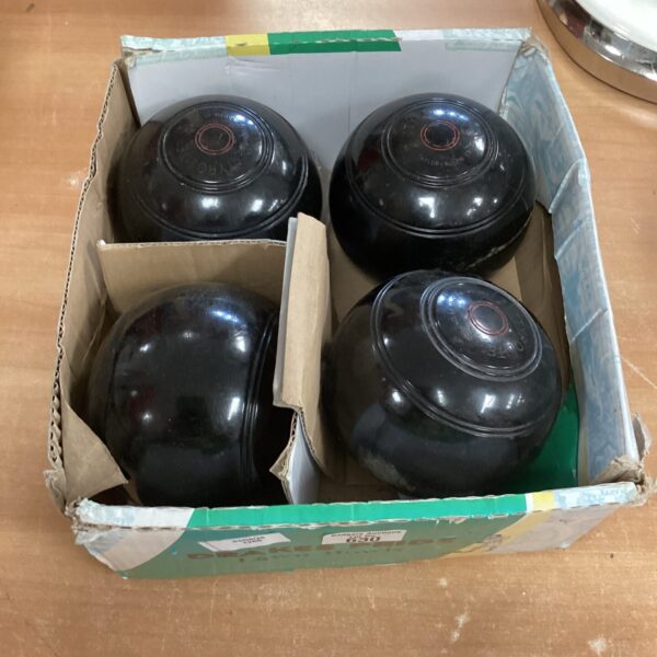 Set of four tyrolite lawn bowls
