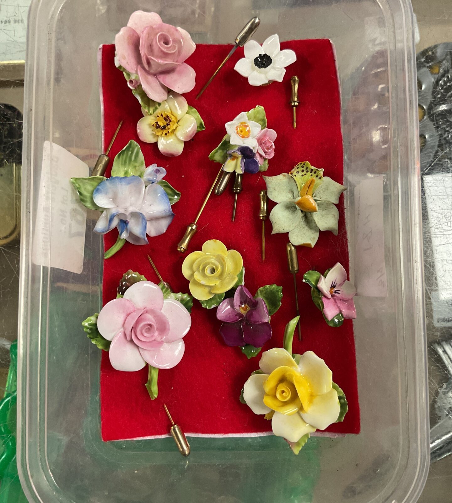Colection of floral stick pins inc coalport