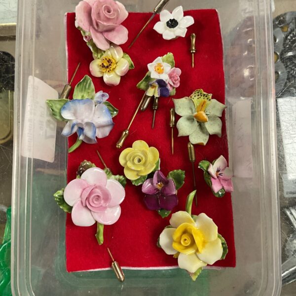 Colection of floral stick pins inc coalport