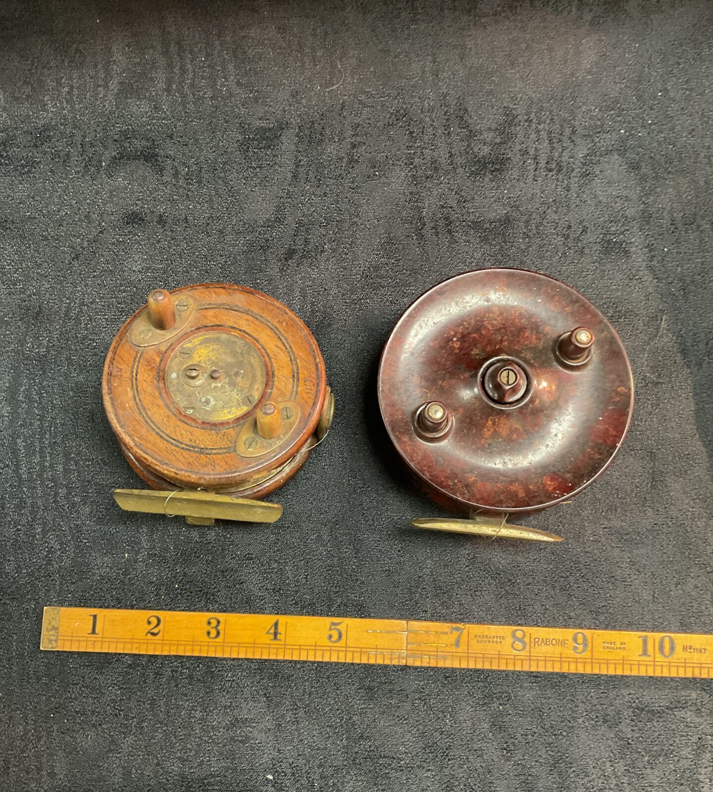 two vintage fishing reels bakelite Elo and wood and brass reel