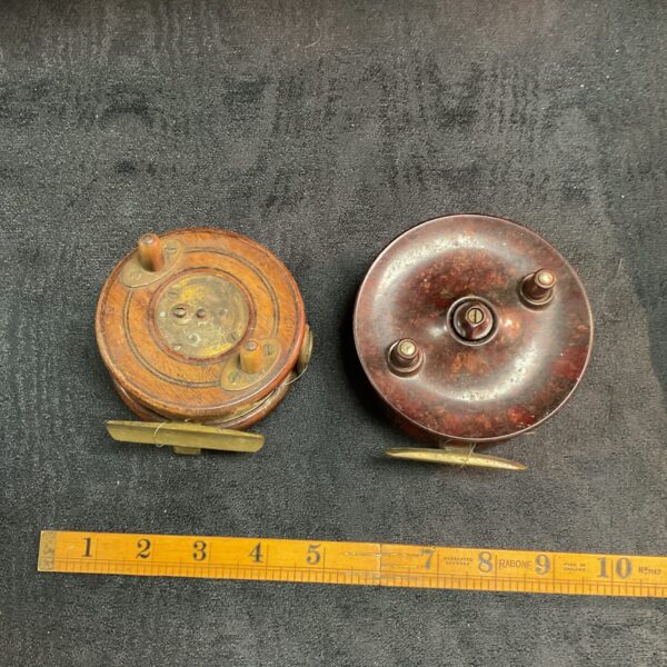 two vintage fishing reels bakelite Elo and wood and brass reel