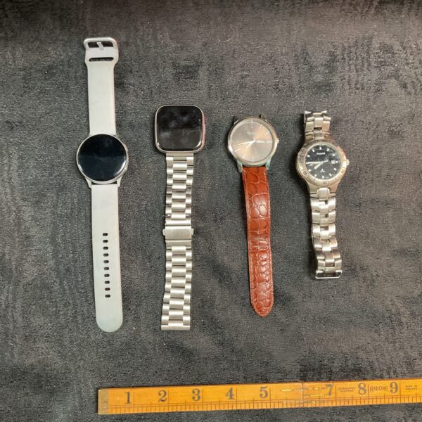 Box of mixed watches inc Samsung Galaxy Watch And Fitbit Purepulse