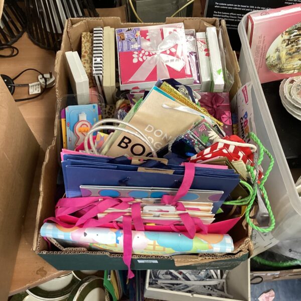 Box of mixed party supplies inc gift bags, candles & balloons