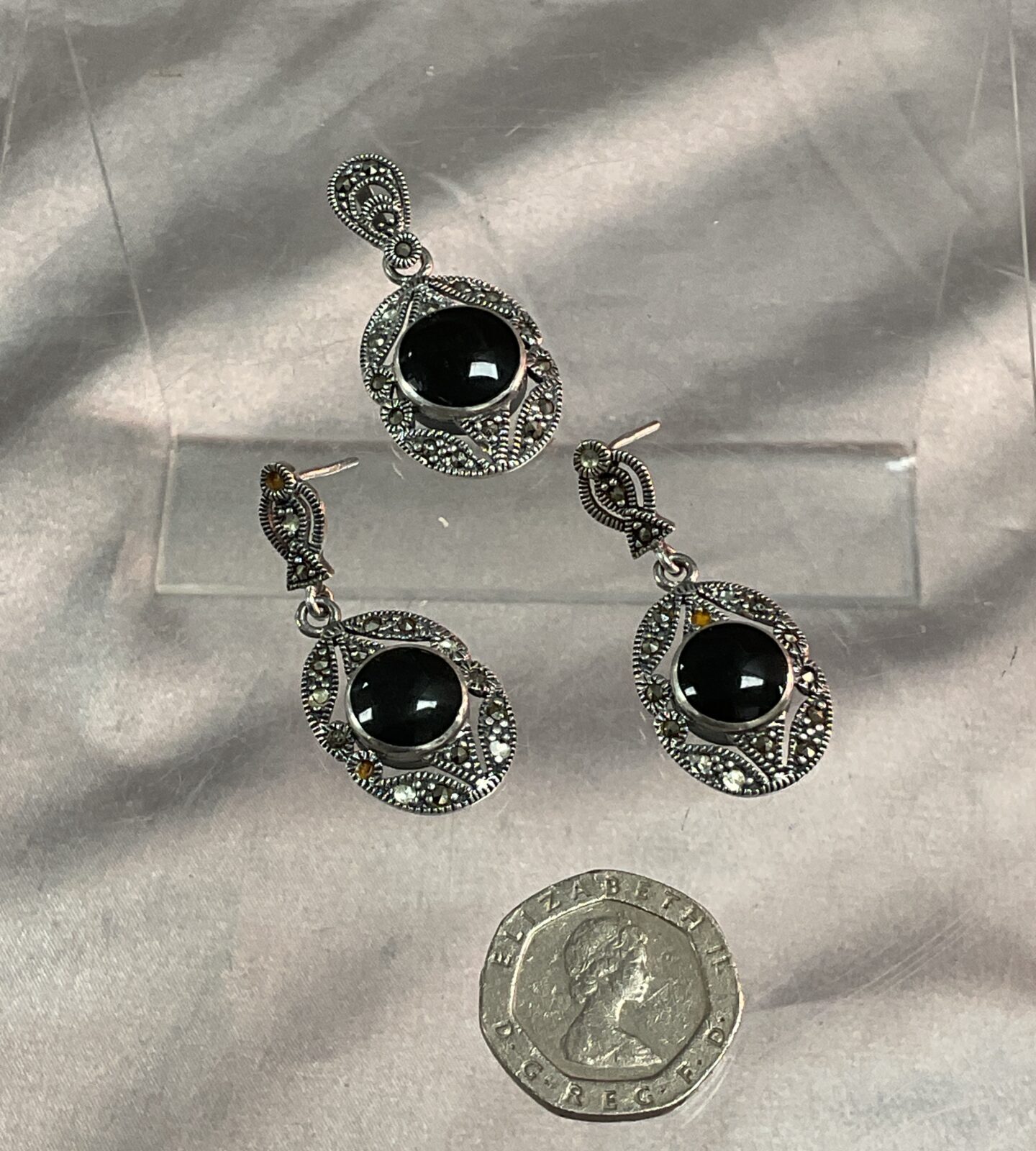 Pair of 925 silver Marcasite earrings and matching pendant