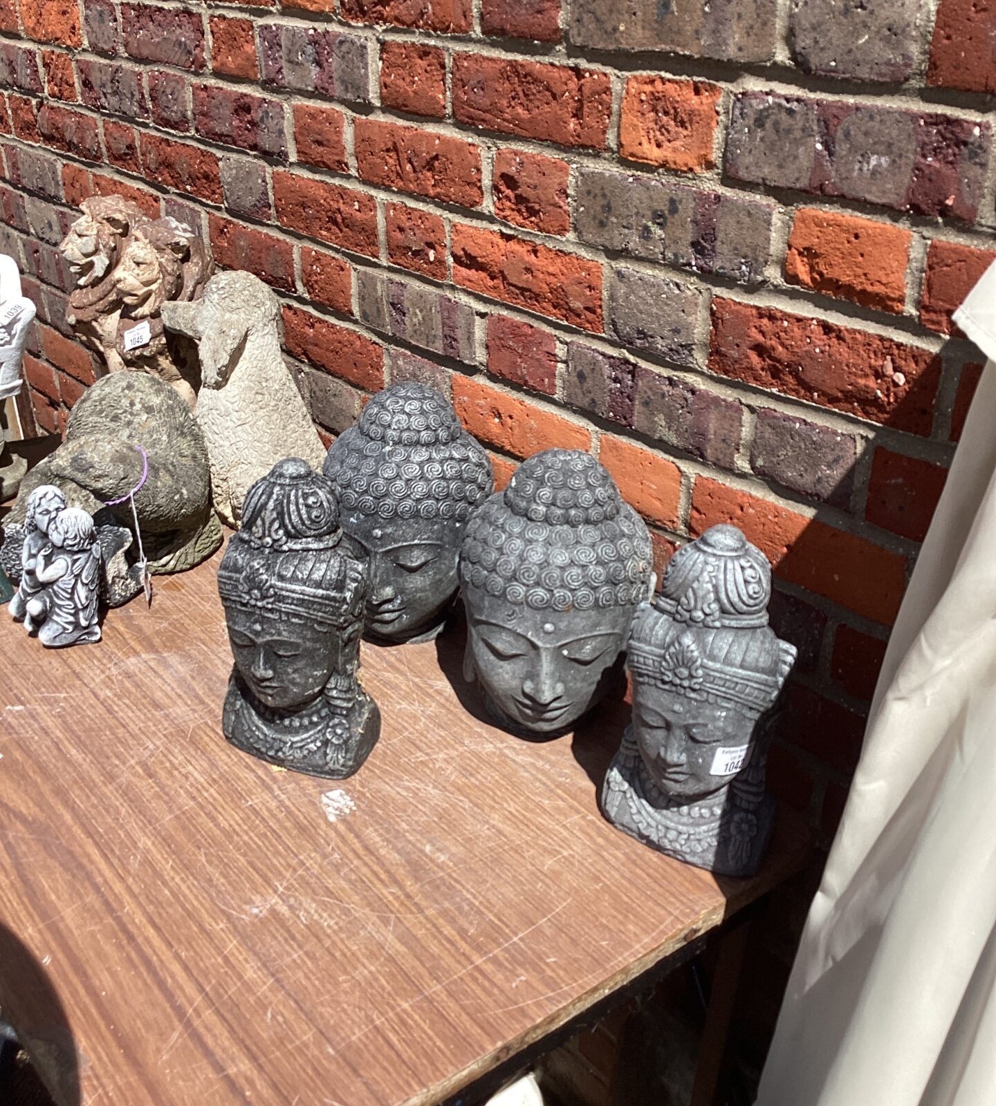 Four Buddha Head garden ornaments