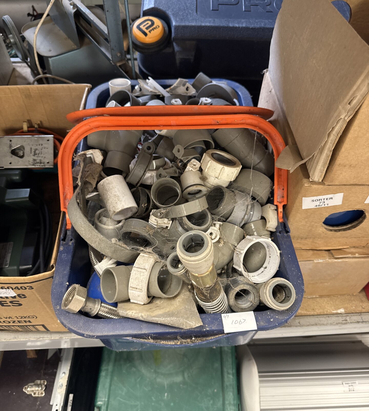Basket of shed clearance plumbing items