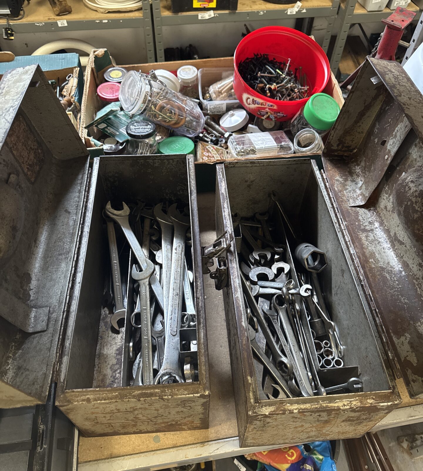 Two metal toolboxes with spanners contents