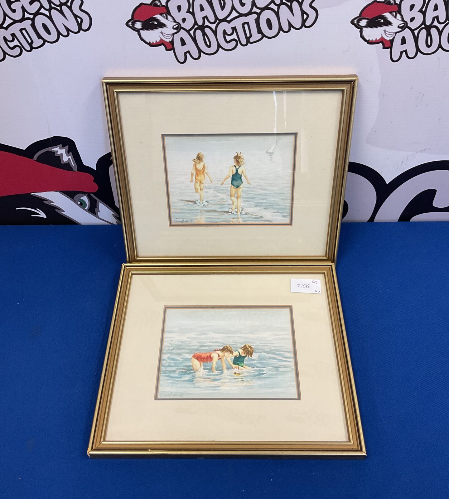 Pair of original artist signed watercolour ps of young children playing in the sea